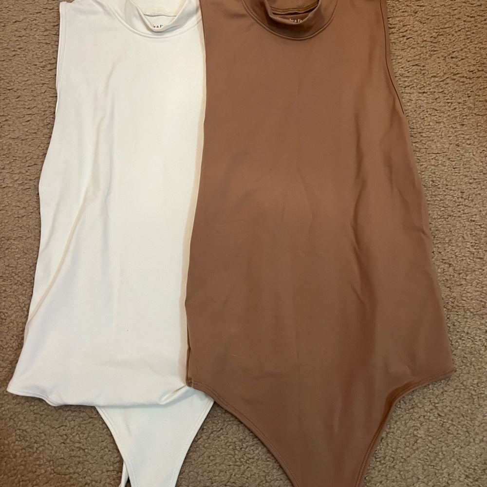 White and Brown Sleeveless Bodysuits